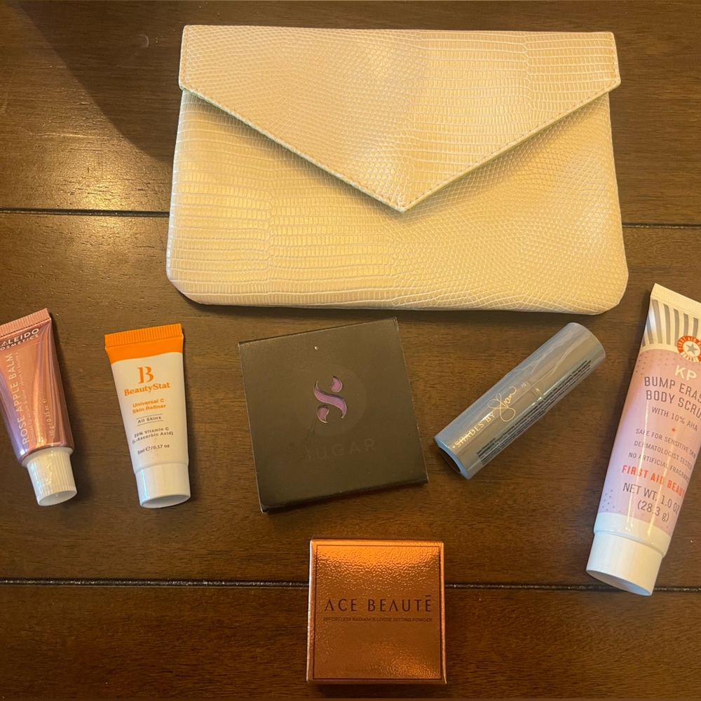 Ipsy bag with 6 new make up & beauty items